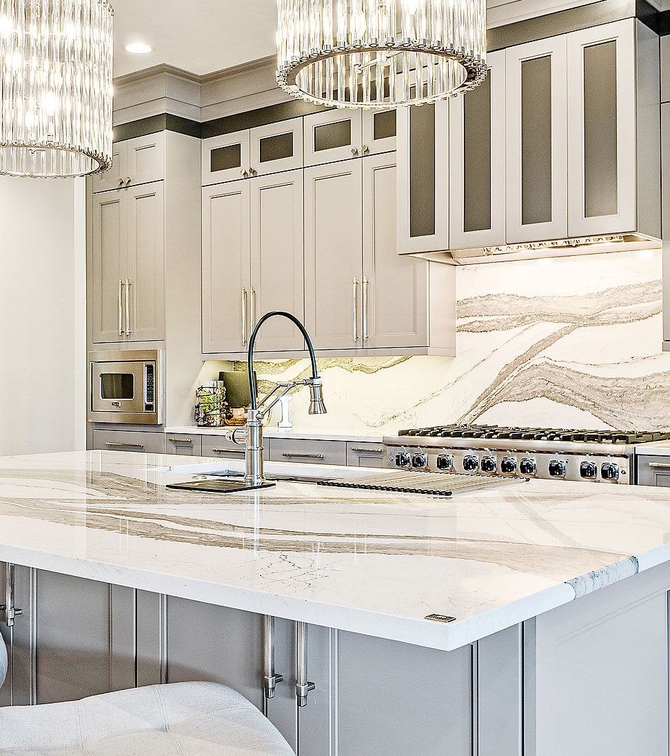 Modern kitchen with white quartz countertops and dramatic veining in Delaware